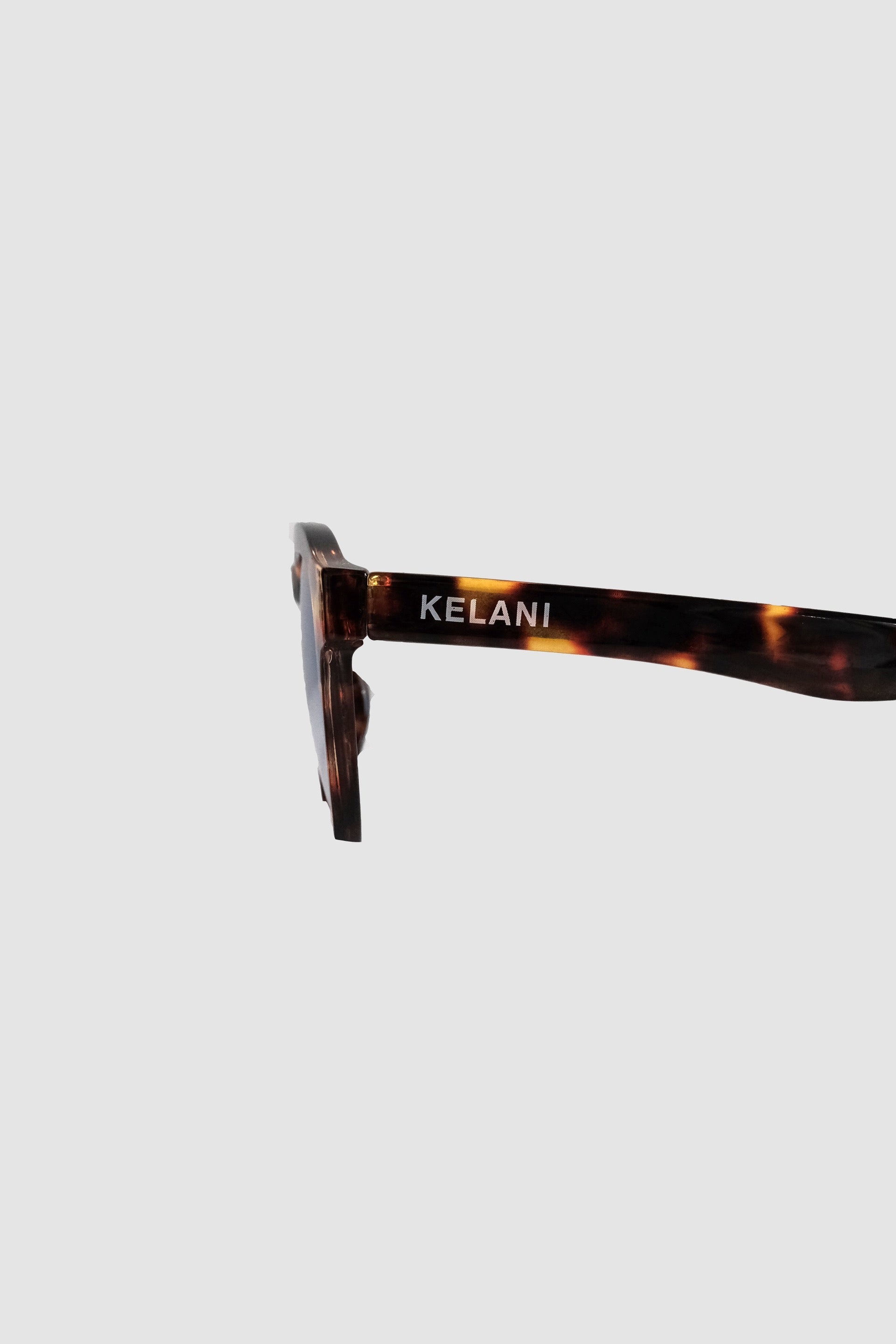 Lotus - tortoiseshell with blue lenses